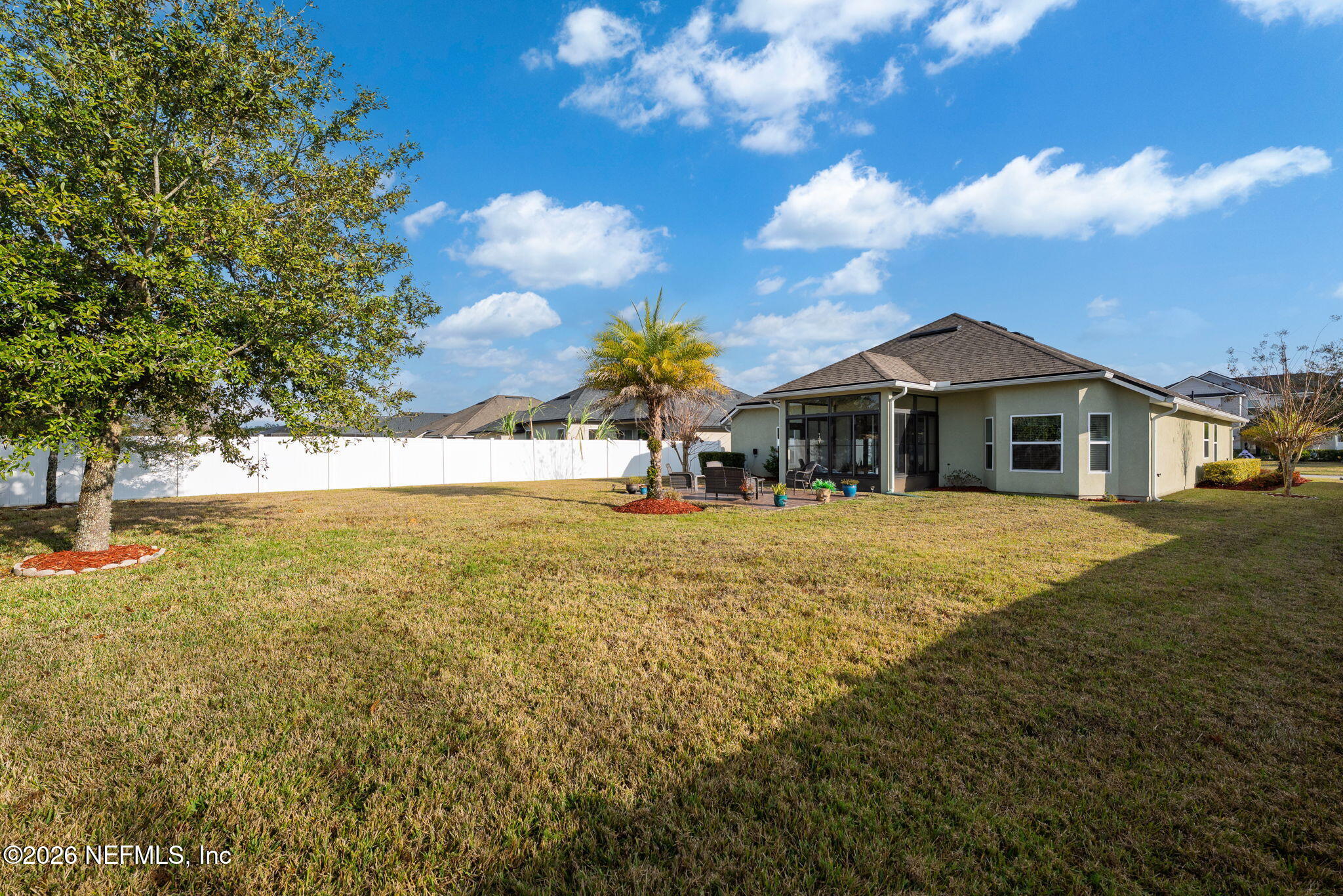 405 Porta Rosa Circle St. Augustine, FL 32092 - Photo 34 of 55 a house view with swimming pool and garden space