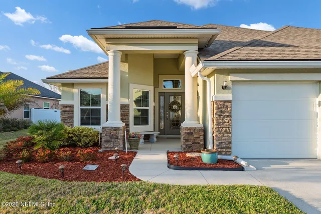 a view of a swimming pool with a patio