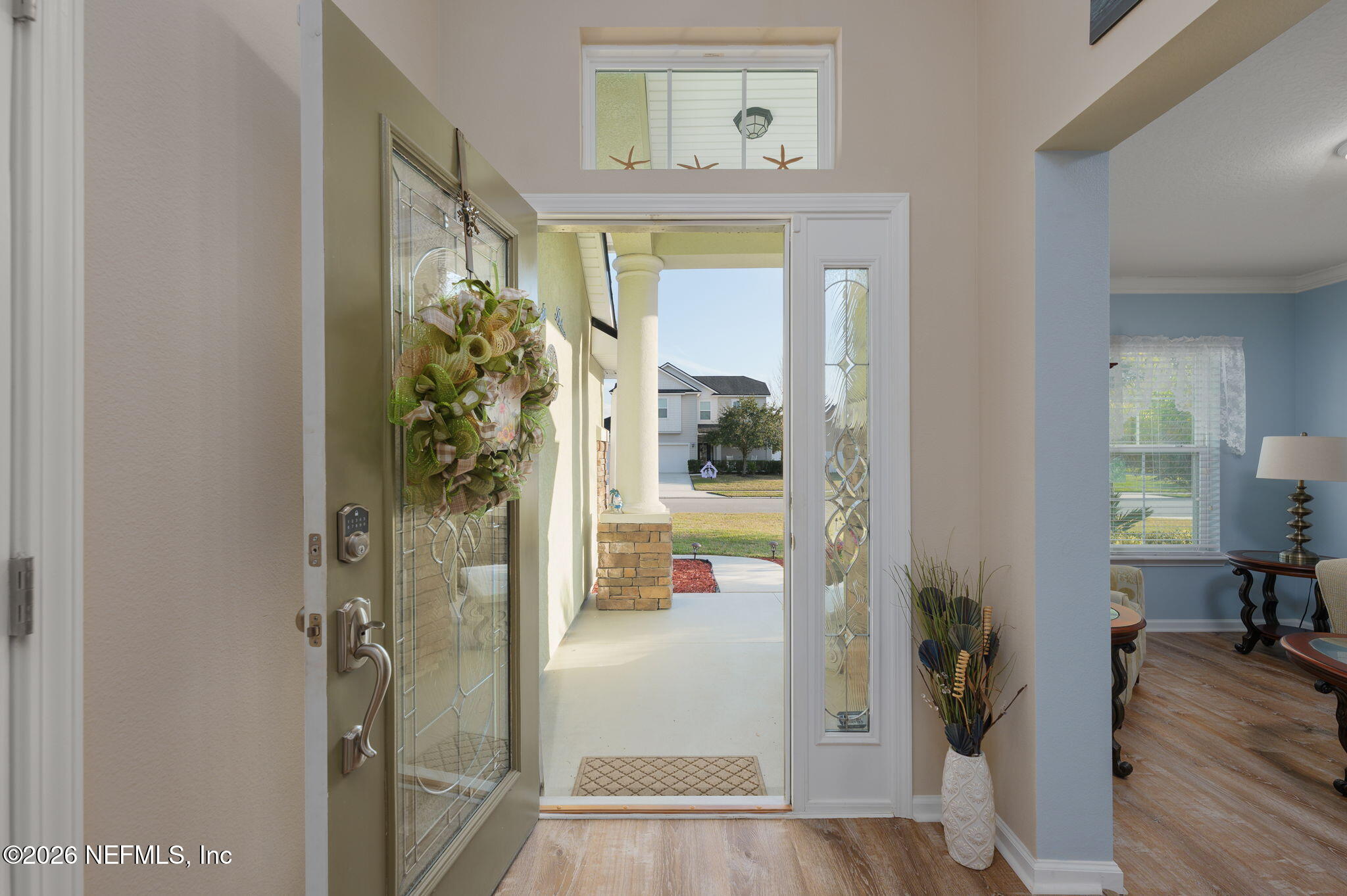 405 Porta Rosa Circle St. Augustine, FL 32092 - Photo 7 of 55 a view of a hallway with bathroom and wooden floor