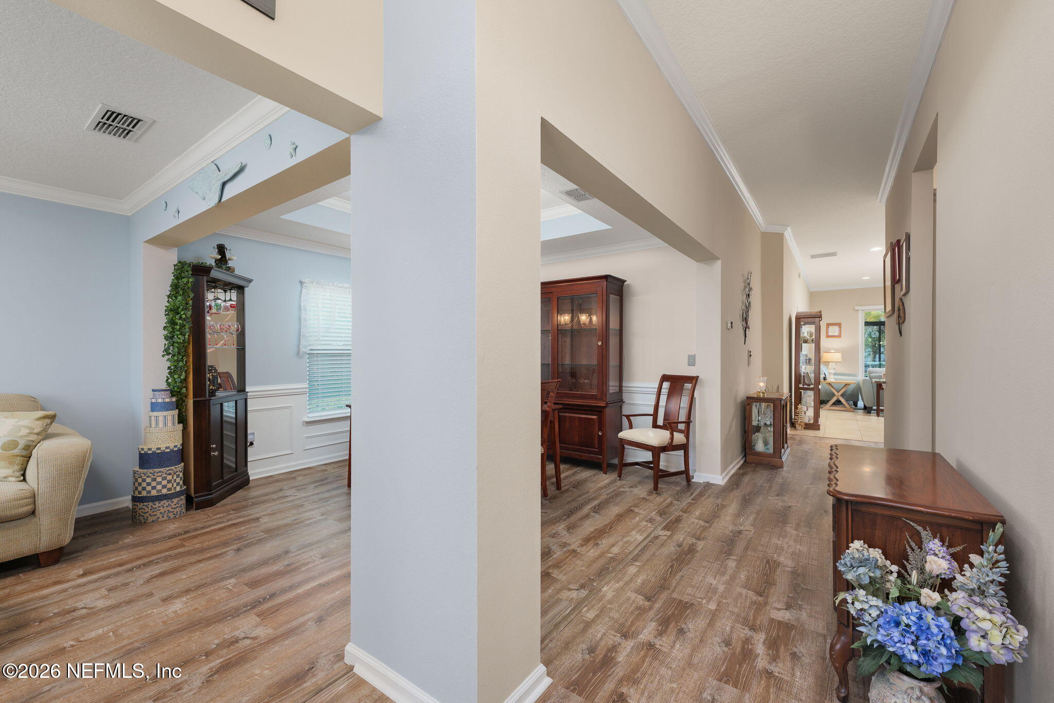 405 Porta Rosa Circle St. Augustine, FL 32092 - Photo 8 of 55 a living room with furniture and a wooden floor