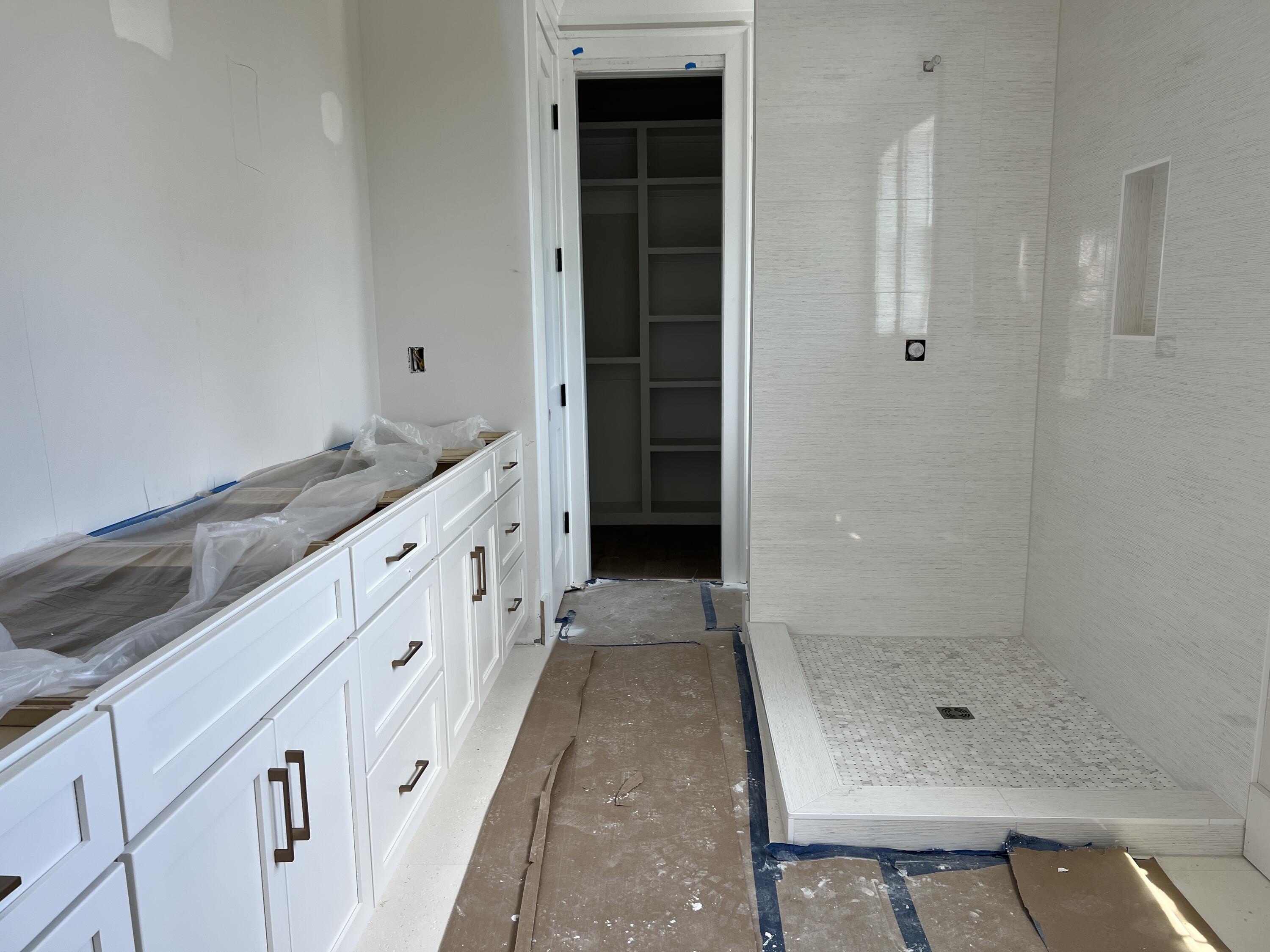 40 Sand Flea Dr Inlet Beach Inlet Beach, FL 32461 - Photo 20 of 37 a bathroom with a granite countertop sink a toilet and shower