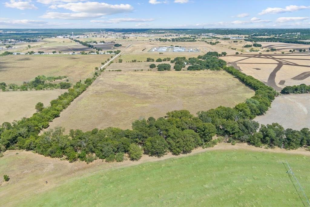 410 State School Road Gatesville, TX 76528 - Photo 14 of 39 Expansive agricultural land featuring a tree-lined perimeter and clear skies