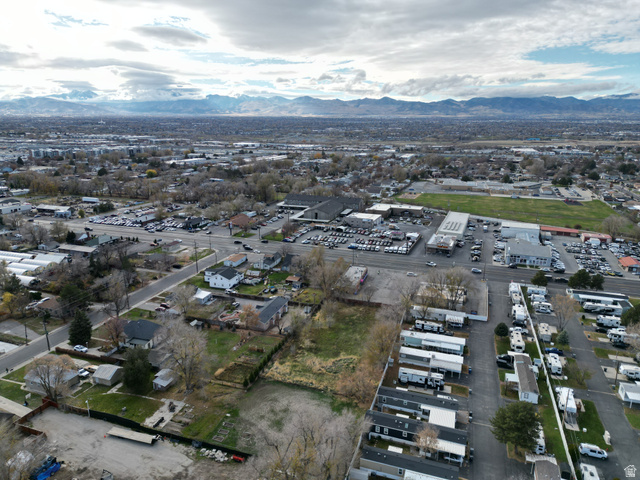 8475 South State Street Sandy, UT 84070 - Photo 13 of 31 Aerial overview of property's location featuring mountains