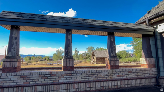 426 West Center Street Parowan, UT 84761 - Photo 92 of 107 Covered walkway with brick base and distressed wood columns