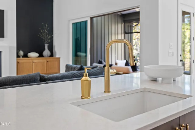 a bathroom with a sink double vanity and a mirror