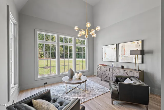 a bedroom with a bed a couch and dresser