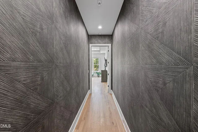 a living room with furniture and a garden