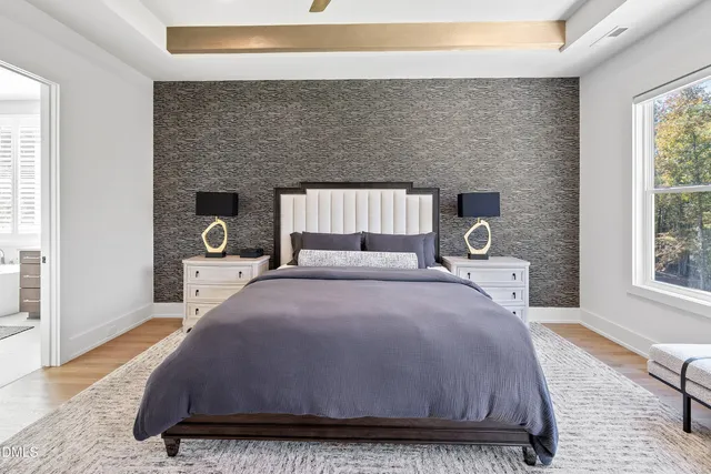 a view of swimming pool with outdoor seating and plants