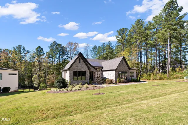 a view of a house with a garage