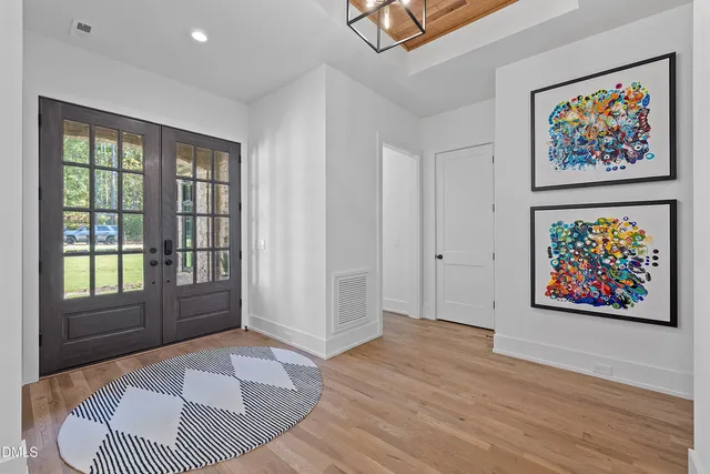 a living room with furniture and a fireplace or television