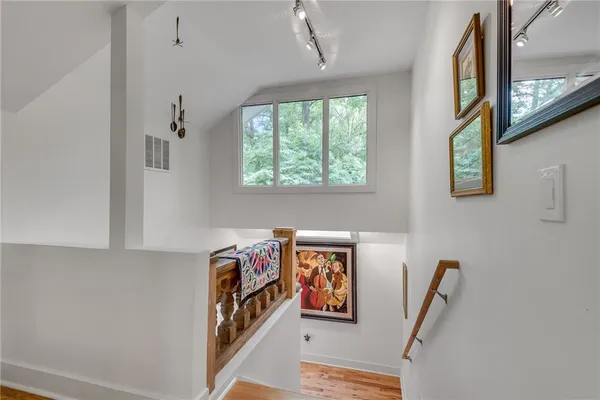 a view of a hallway with workspace