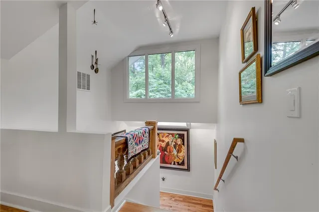 a view of a hallway with workspace