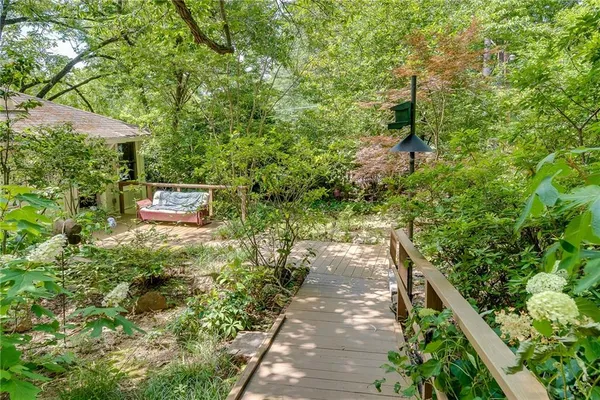 a view of a garden with pathway