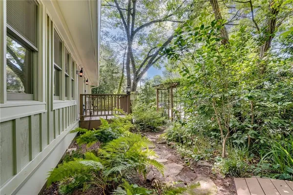 a backyard of a house with lots of green space
