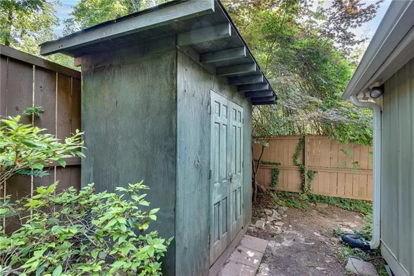 a picture of a bathroom with a shower