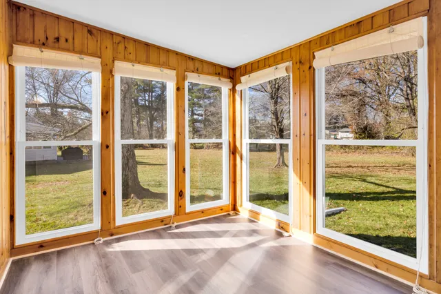 a view of an empty room and window
