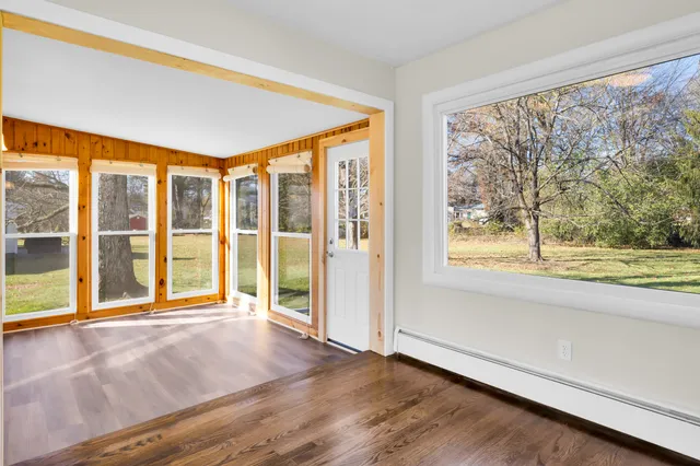 a view of an empty room and window