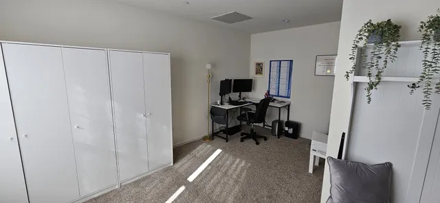 a view of a livingroom with a staircase
