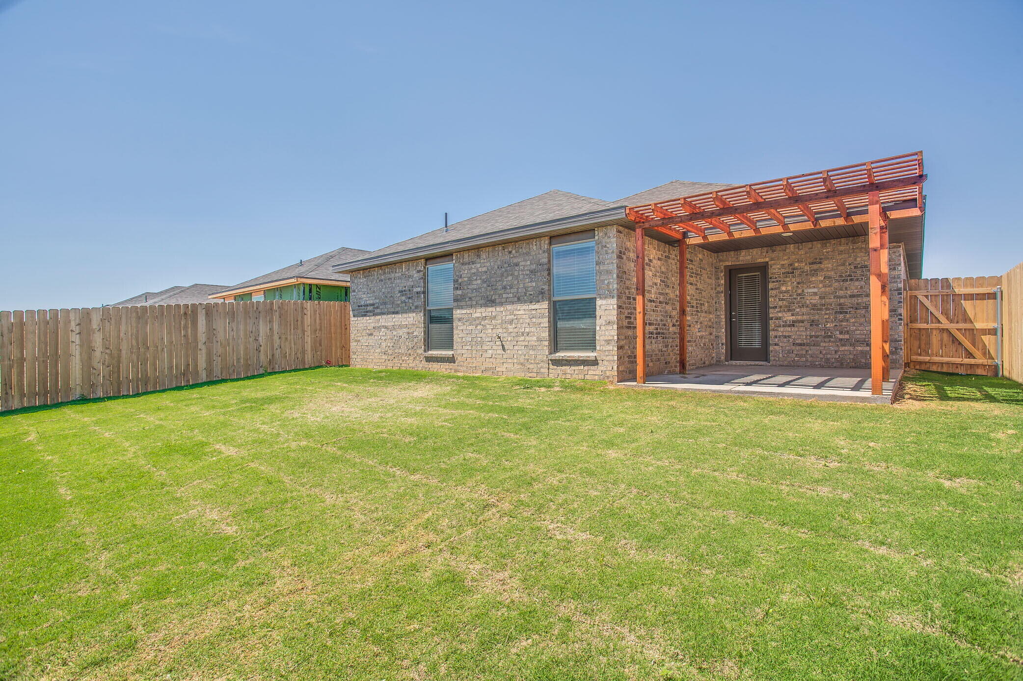 1905 140th Street Lubbock, TX 79423 - Photo 19 of 19 front view of a house with a yard