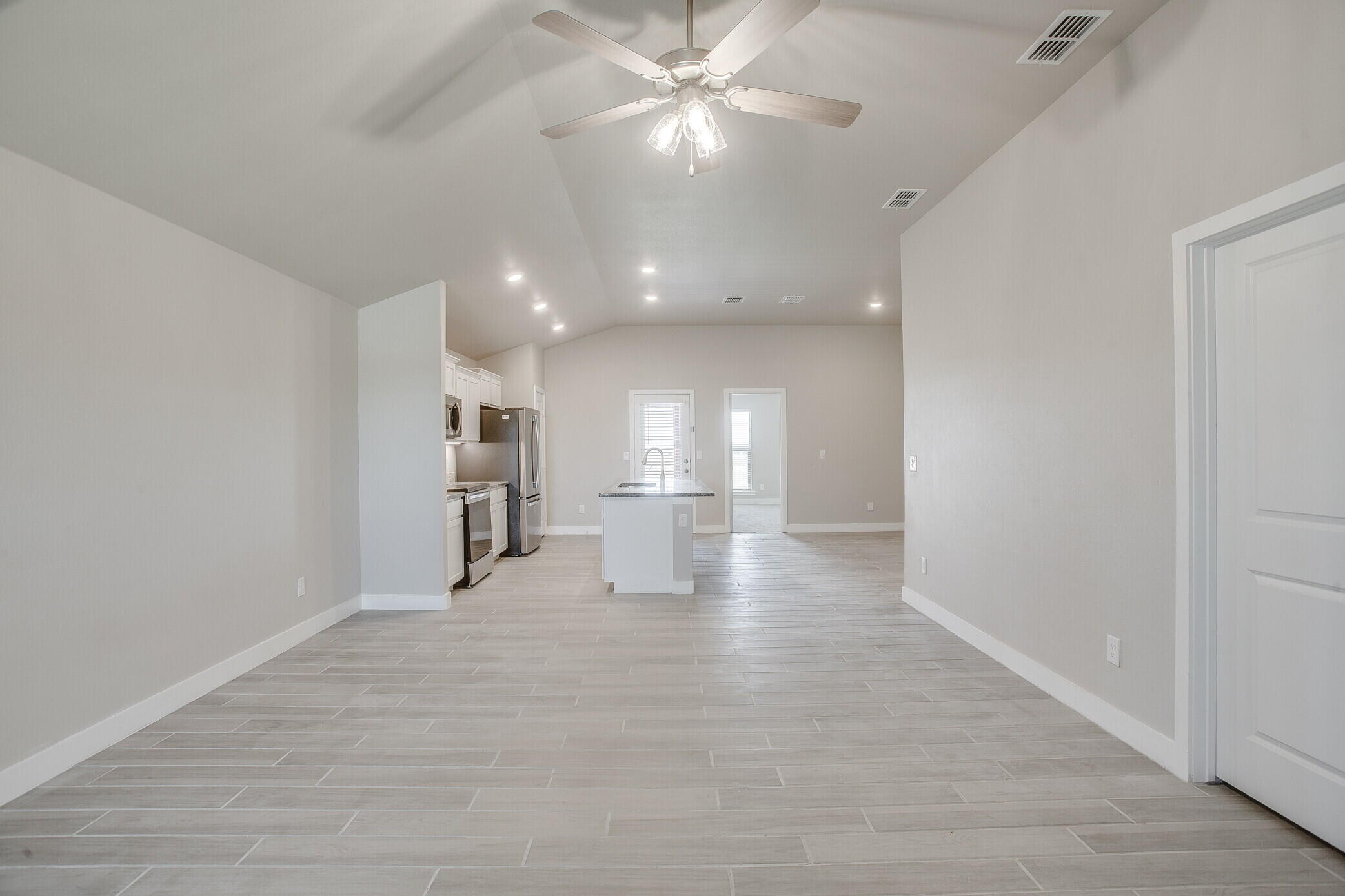1905 140th Street Lubbock, TX 79423 - Photo 2 of 19 a view of an empty room and kitchen view