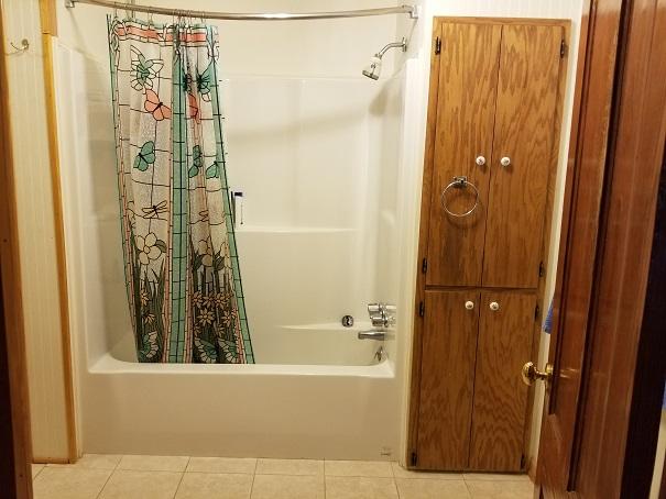 2407 4 Holes Road Orangeburg, SC 29115 - Photo 15 of 27 Bathroom with Tub & Linen Closet