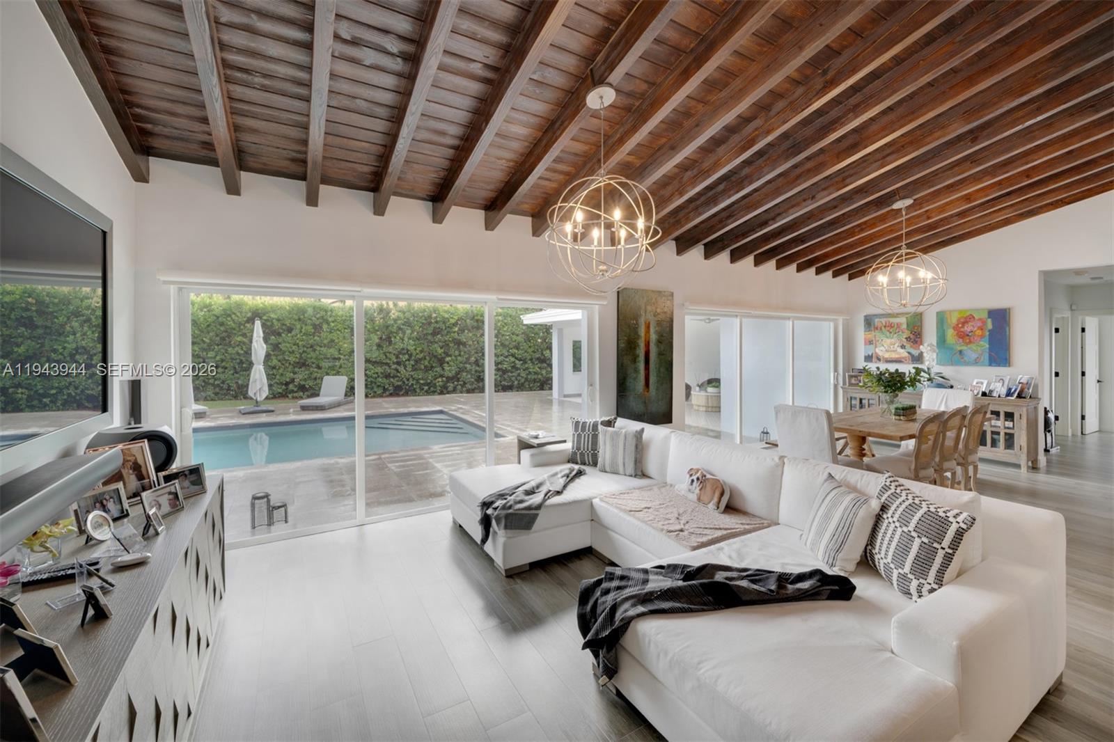 13333 Southwest 59th Court Pinecrest, FL 33156 - Photo 6 of 16 a living room with furniture