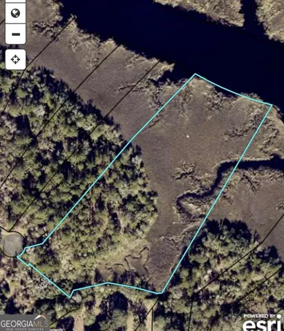 an aerial view of house with a yard