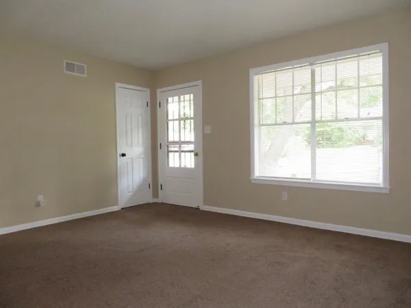 an empty room with a window