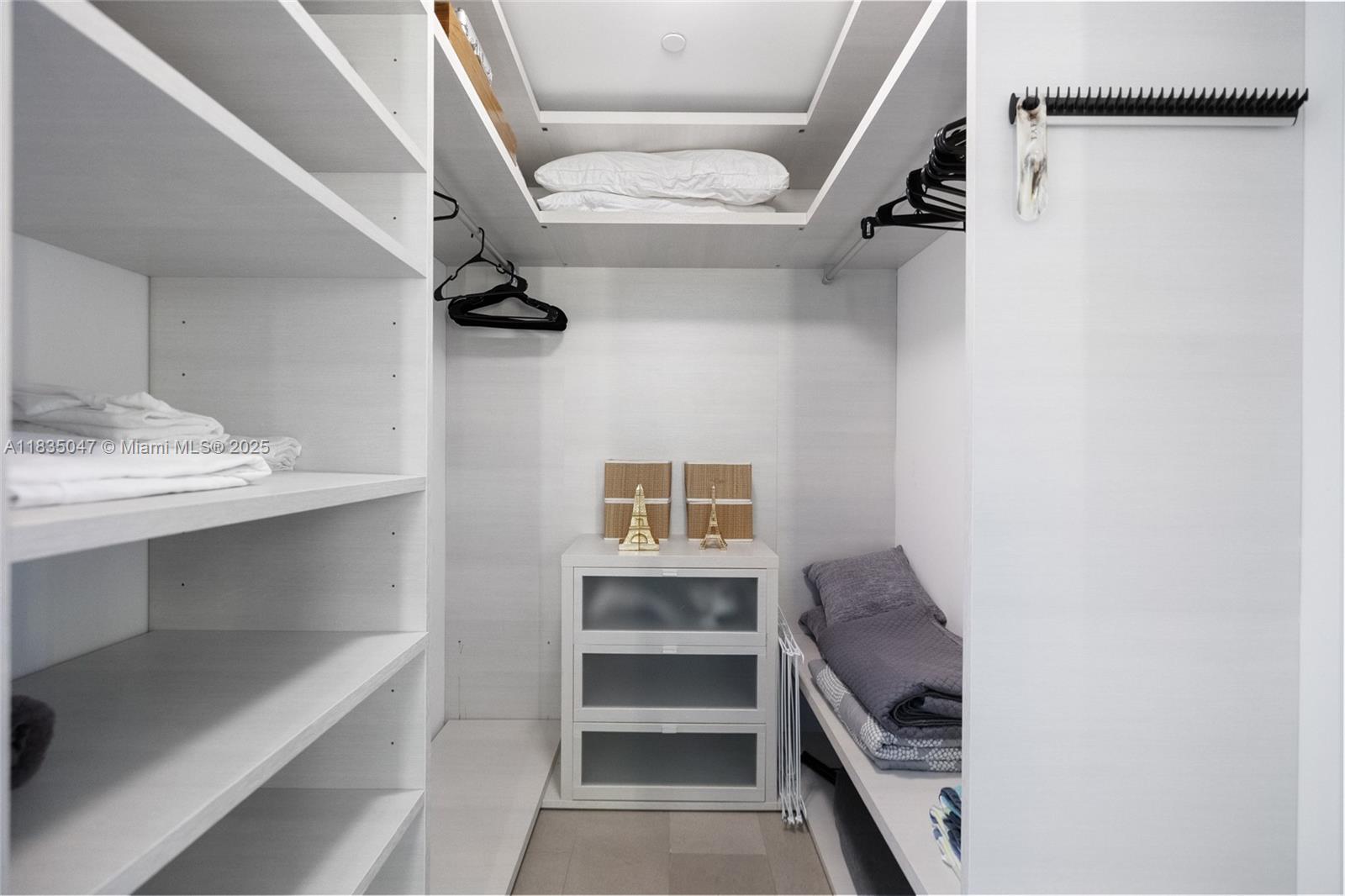 88 Southwest 7th Street, Unit 1010 Miami, FL 33130 - Photo 19 of 42 a view of bedroom and bathroom