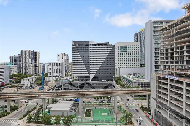 a view of a city with tall buildings