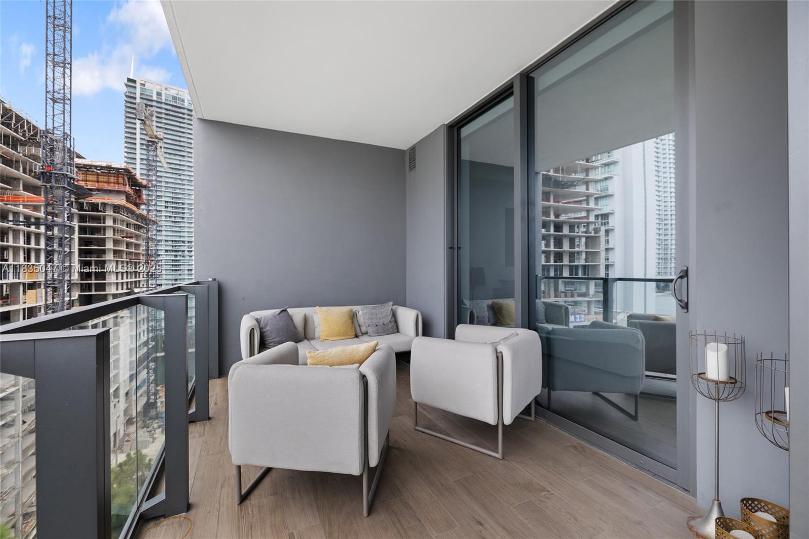 88 Southwest 7th Street, Unit 1010 Miami, FL 33130 - Photo 30 of 42 a living room with furniture and a window