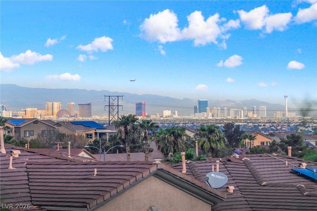 224 Positive Point Street Henderson, NV 89012 - Photo 36 of 44 Distant mountain silhouettes frame a commanding city view.