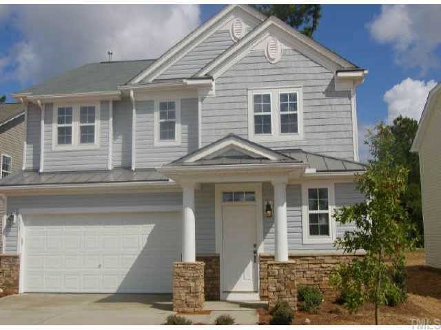 173 Ryder Cup Circle Raleigh, NC 27603 - Photo 1 of 1 a front view of a house with garden