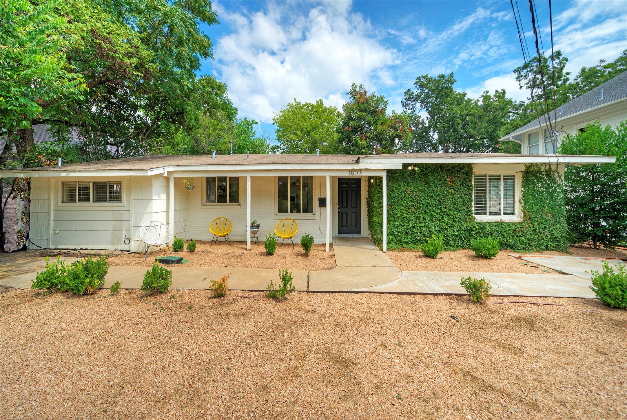 1803 Pearl Street Austin, TX 78701 - Photo 1 of 33 a house view with a outdoor space