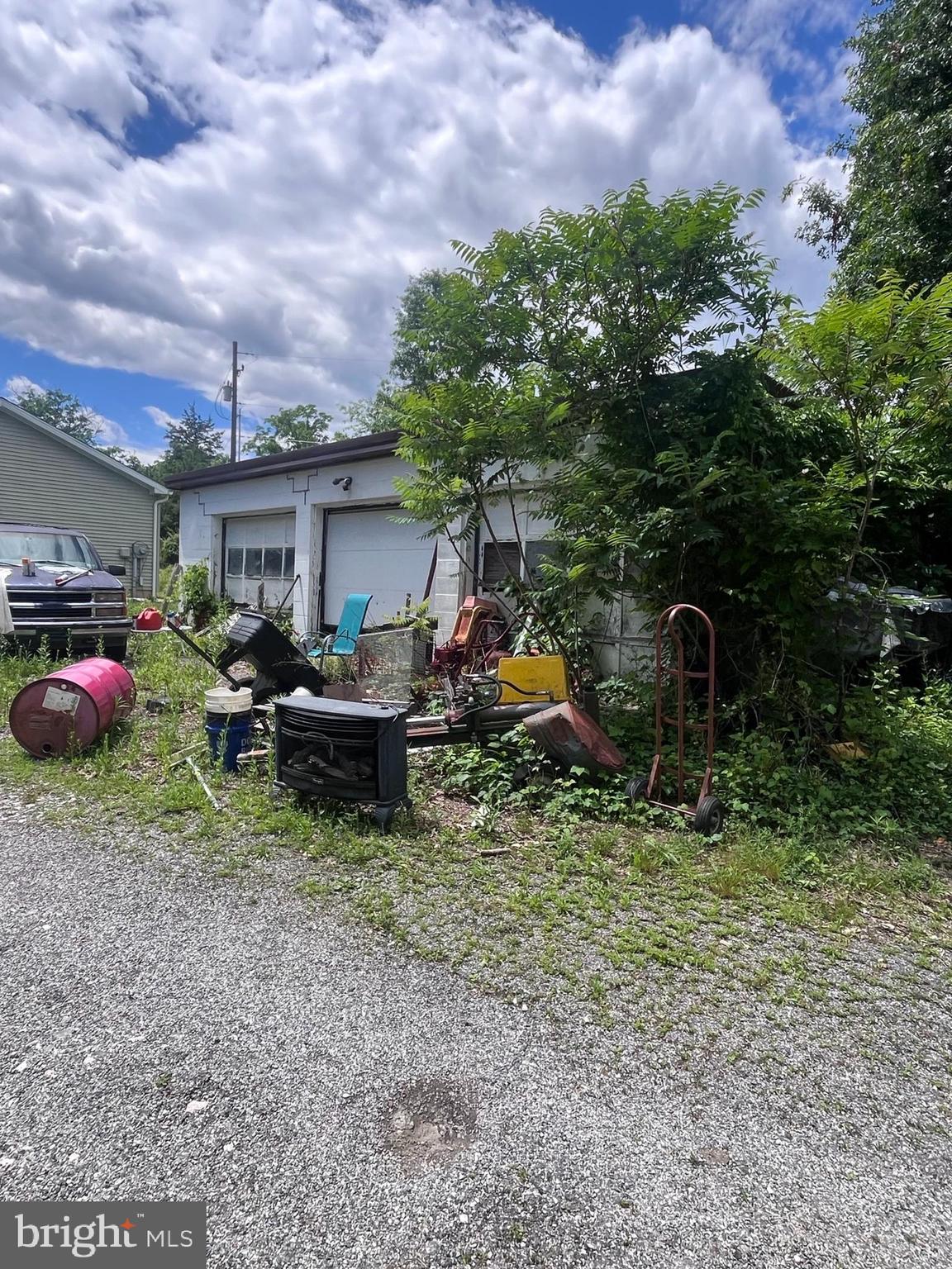 600 Ridge Road Dillsburg, PA 17019 - Photo 15 of 15 a view of a backyard with a table and chairs