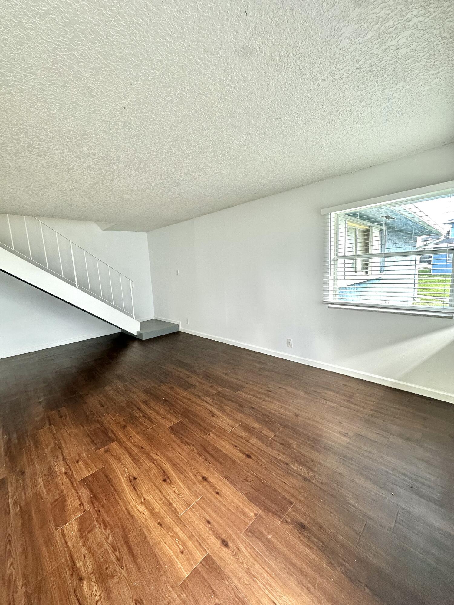 108 East Tiffany Drive, Unit 2 West Palm Beach, FL 33407 - Photo 3 of 14 wooden floor in a room