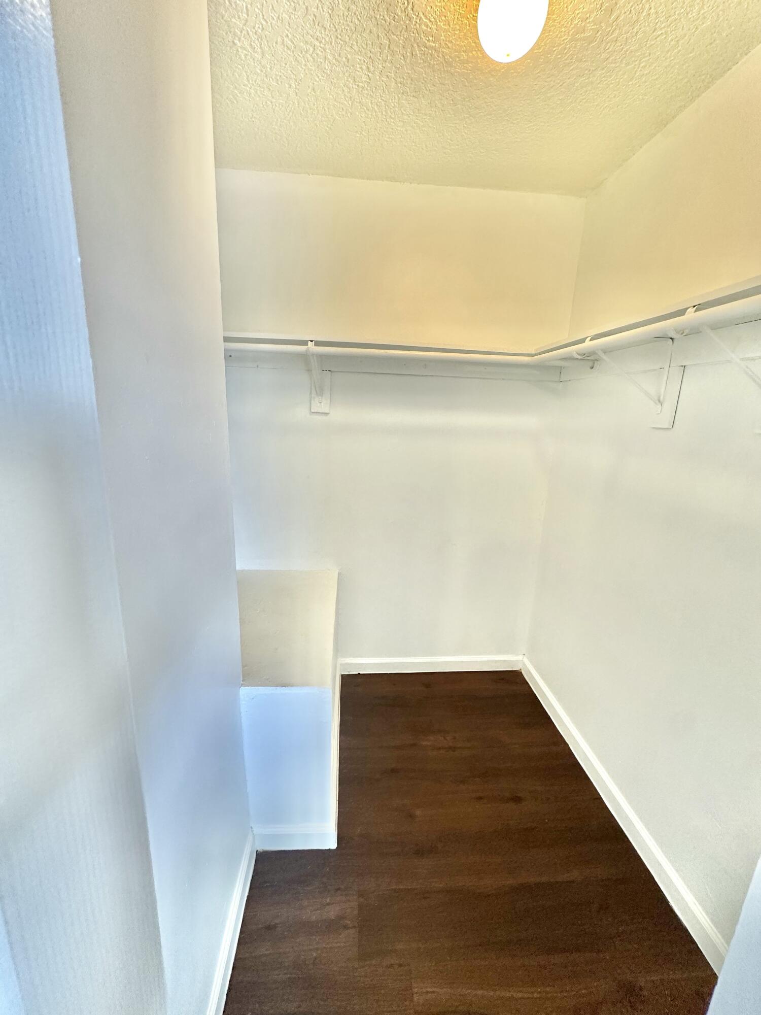 108 East Tiffany Drive, Unit 2 West Palm Beach, FL 33407 - Photo 8 of 14 a view of an empty walk in closet