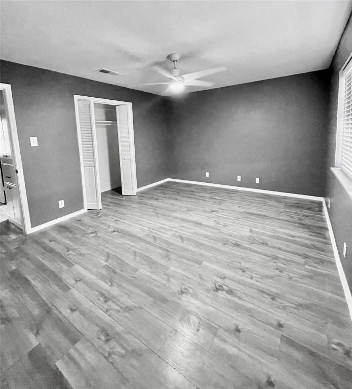 5929 Alsace Trail Austin, TX 78724 - Photo 17 of 18 a view of empty room with wooden floor