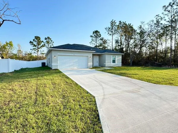 a view of a house with a swimming pool