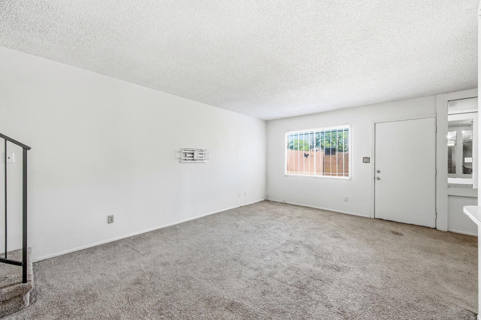 6705 West Devonshire Avenue Phoenix, AZ 85033 - Photo 10 of 11 an empty room with windows