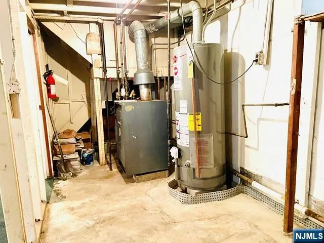 a view of a hallway with washer and dryer