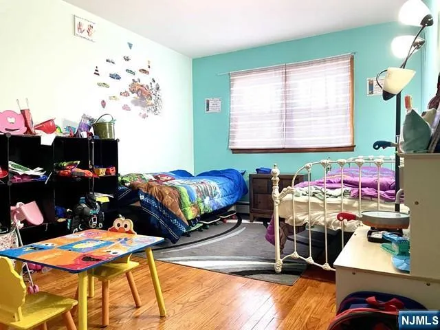 a living room filled with furniture and a window
