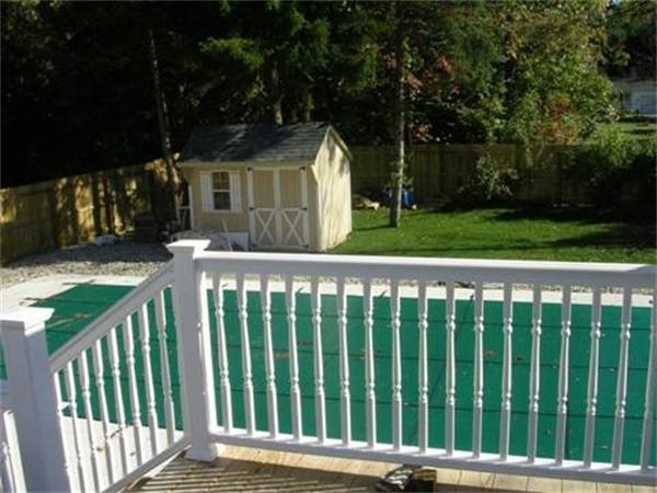 153 Cedar Road Longmeadow, MA 01106 - Photo 17 of 21 a view of a wooden fence