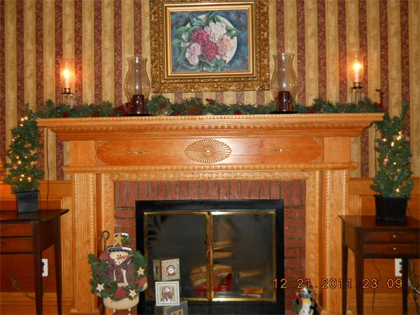 153 Cedar Road Longmeadow, MA 01106 - Photo 7 of 21 a bathroom with a fireplace and a painting on the wall