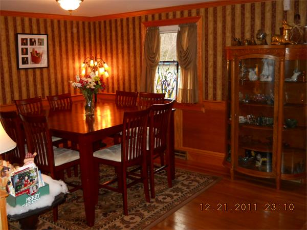153 Cedar Road Longmeadow, MA 01106 - Photo 8 of 21 a view of a dining room with furniture and window