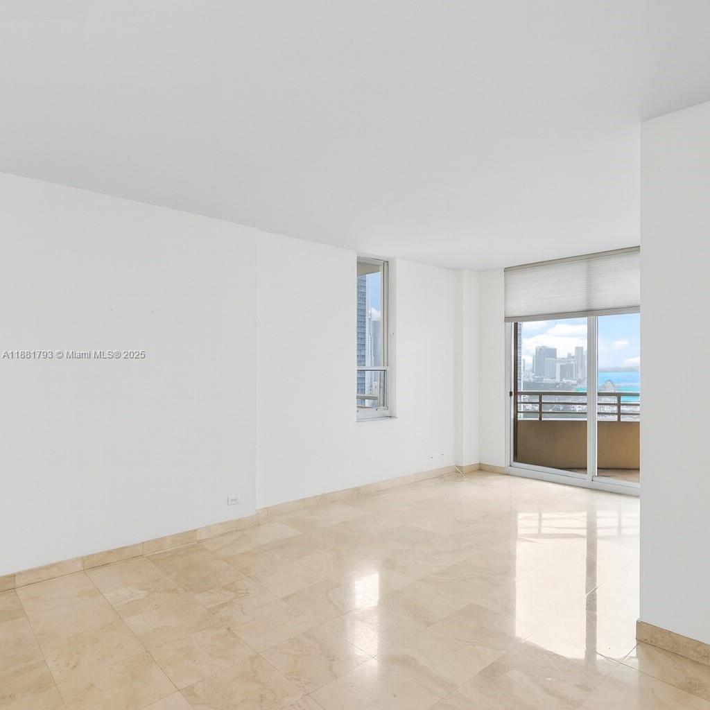 888 Brickell Key Drive, Unit 2510 Miami, FL 33131 - Photo 11 of 22 a view of empty room with window