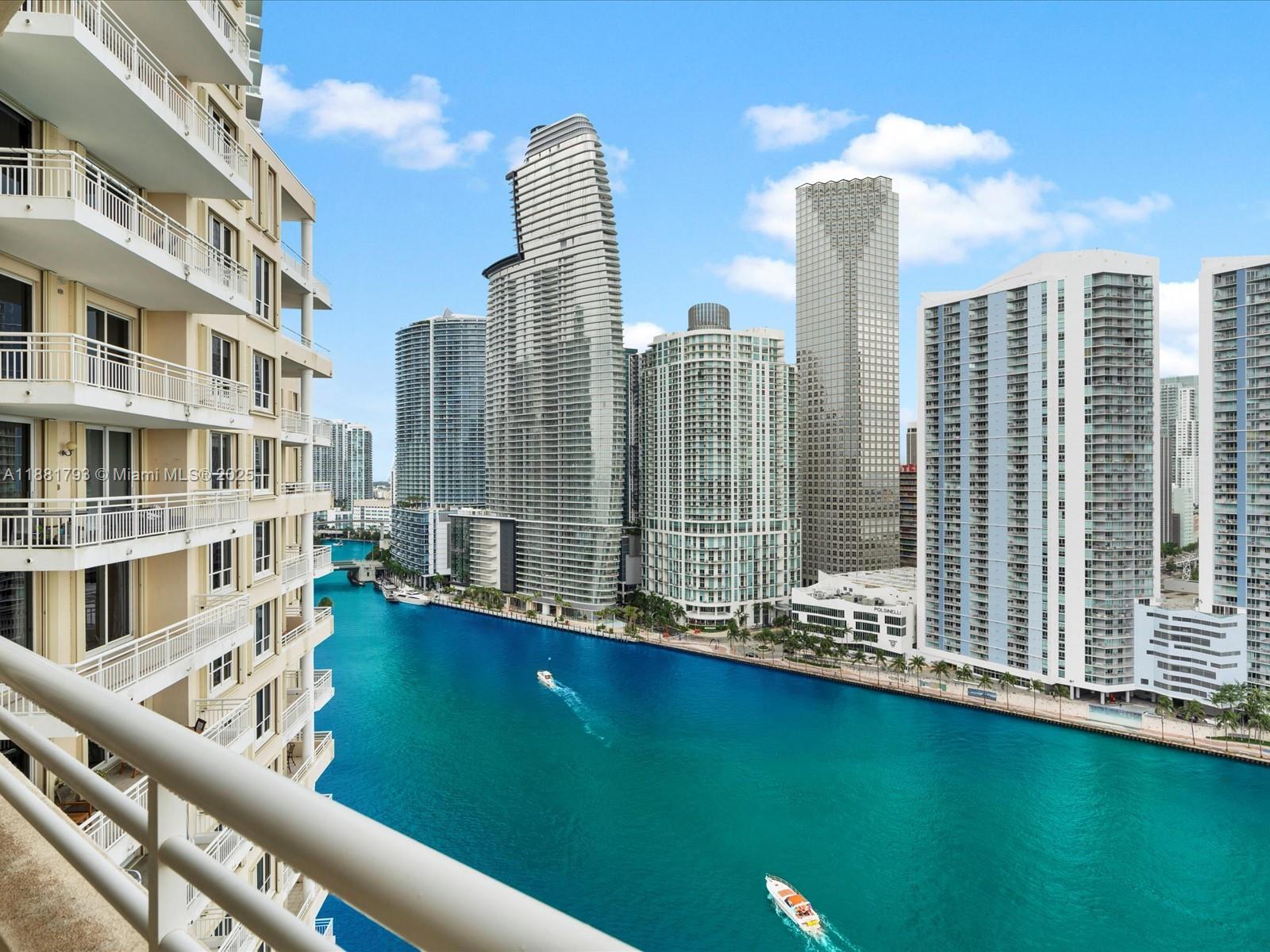 888 Brickell Key Drive, Unit 2510 Miami, FL 33131 - Photo 2 of 22 a view of city with tall buildings