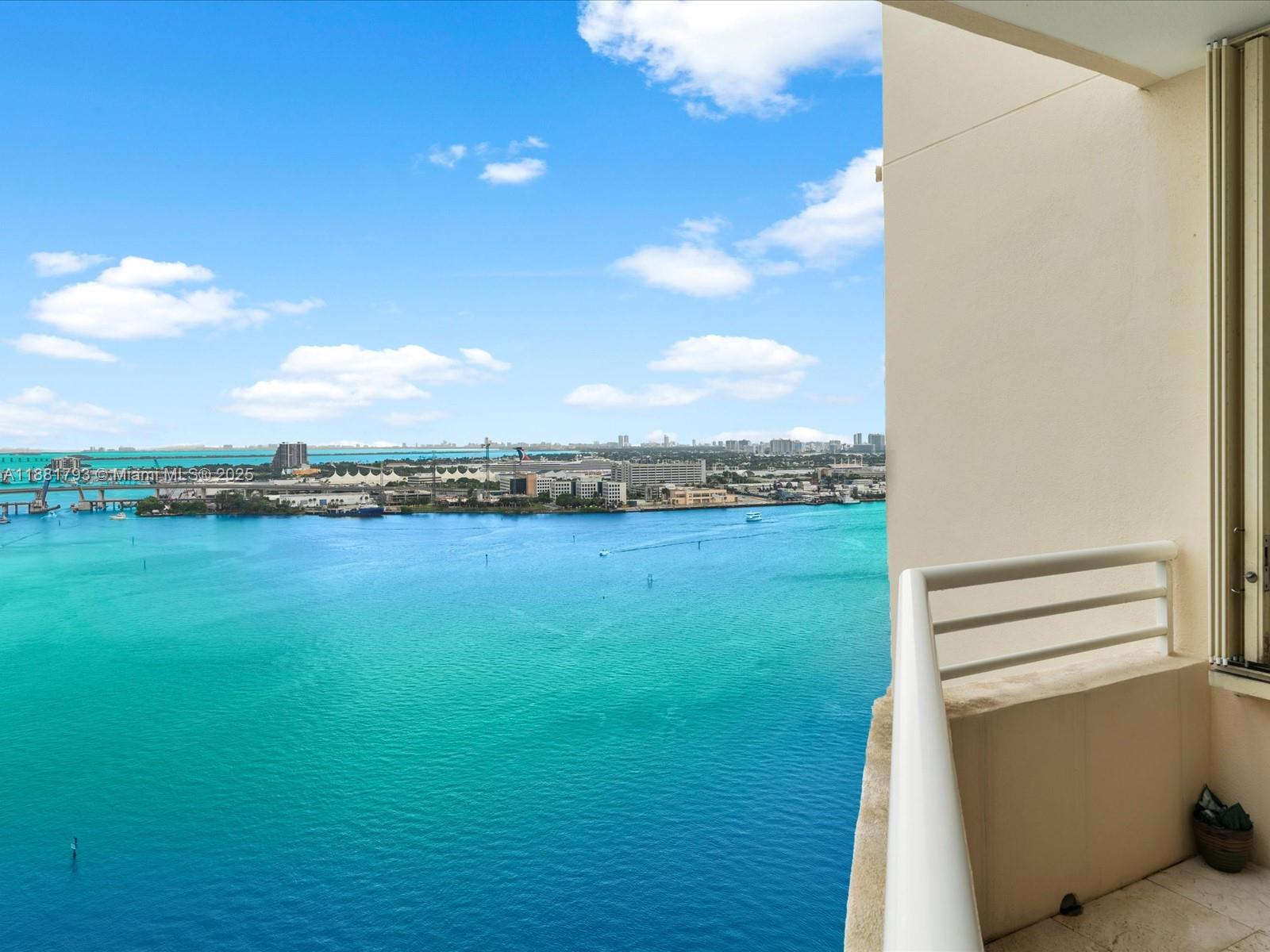 888 Brickell Key Drive, Unit 2510 Miami, FL 33131 - Photo 5 of 22 a view of an ocean from a balcony