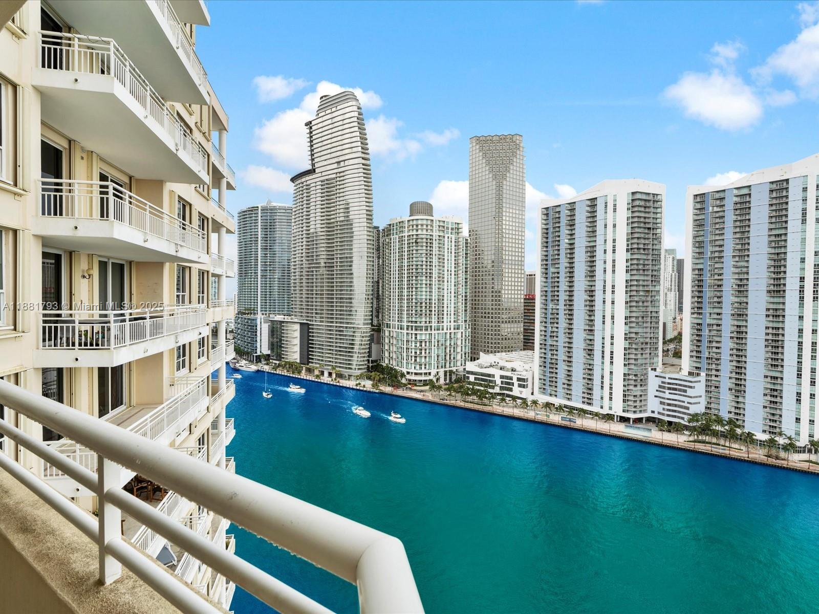 888 Brickell Key Drive, Unit 2510 Miami, FL 33131 - Photo 8 of 22 a view of city with tall buildings