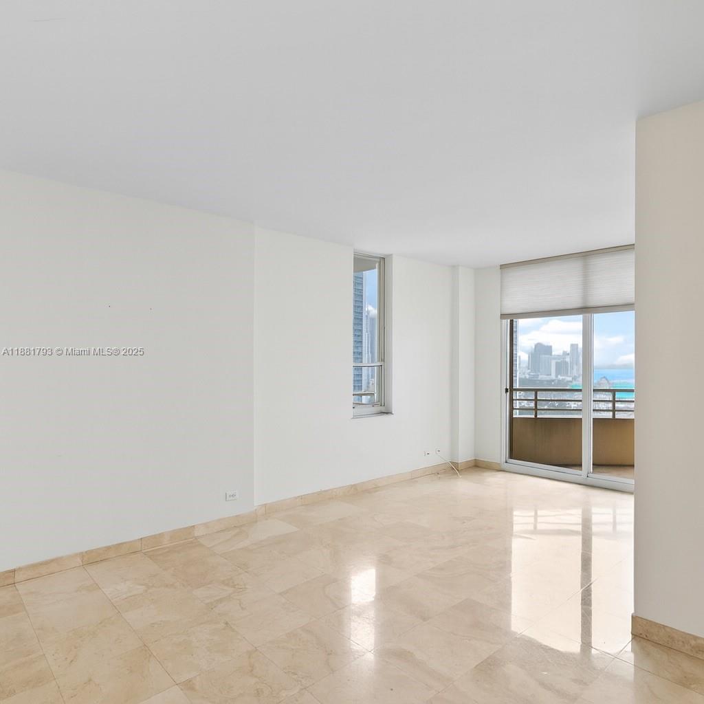 888 Brickell Key Drive, Unit 2510 Miami, FL 33131 - Photo 9 of 22 a view of empty room with window